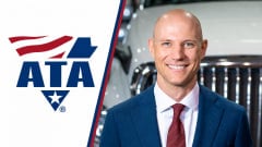 Headshot of Mark Colson in front of a truck grille next to an American Trucking Associations logo