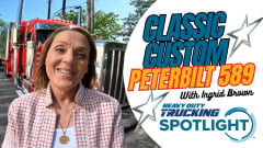YouTube thumbnail with Ingrid Brown, red Peterbilt truck behind her, and the words Classic Custom: Peterbilt 589: Heavy Duty Trucking Spotlight