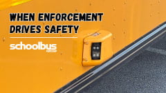 Close-up of a stop-arm enforcement camera mounted on a yellow school bus, with the headline “When Enforcement Drives Safety” and the School Bus Fleet logo.