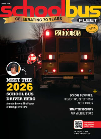 School Bus Fleet magazine cover featuring the rear of a school bus at night, highlighting the 2026 School Bus Driver Hero and features on school bus fires and bus yard security.