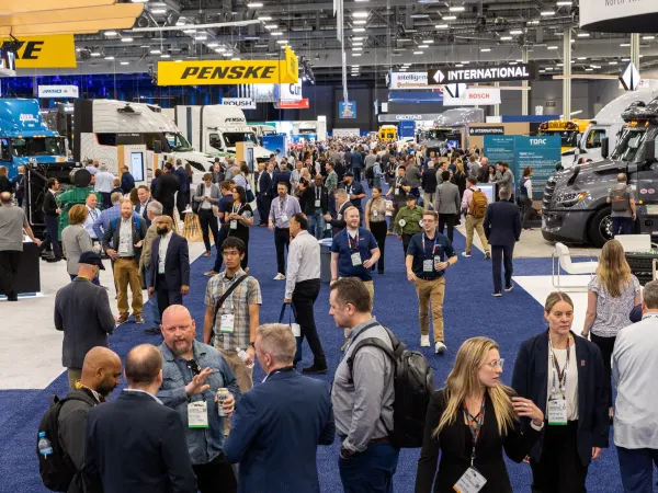 Crowd of people on an expo show floor