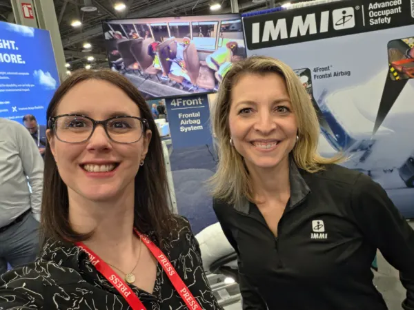Amanda Huggett of School Bus Fleet interviews Katia Dubas of IMMI at the company’s ACT Expo booth showcasing school bus occupant safety technologies and airbag systems.