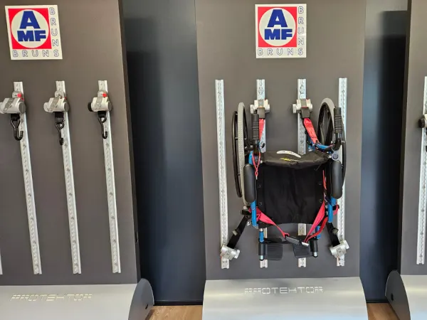 A wheel chair and AMF restraint system in a showroom.