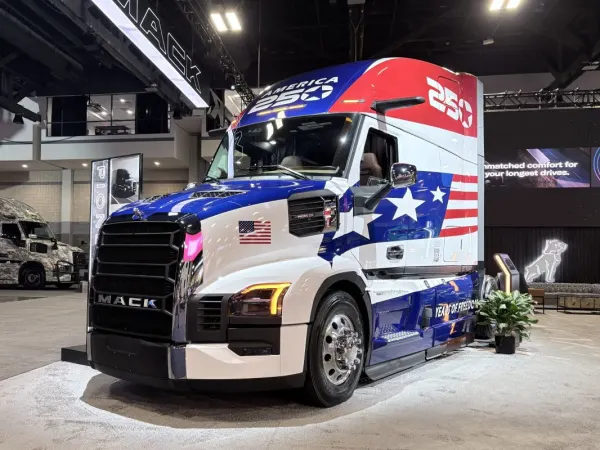 Mack truck decked out in stars and stripes and red white and blue