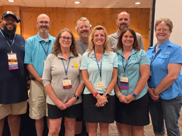 Members of the Michigan Association for Pupil Transportation Board of Directors pose together for a group photo during the 2026 annual conference at Boyne Mountain Resort.