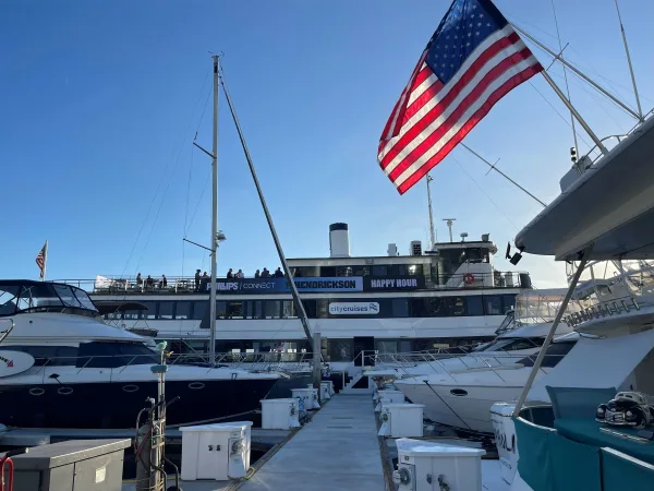 Yacht hosting a Hendrickson/Phillips social event with boats in the foreground