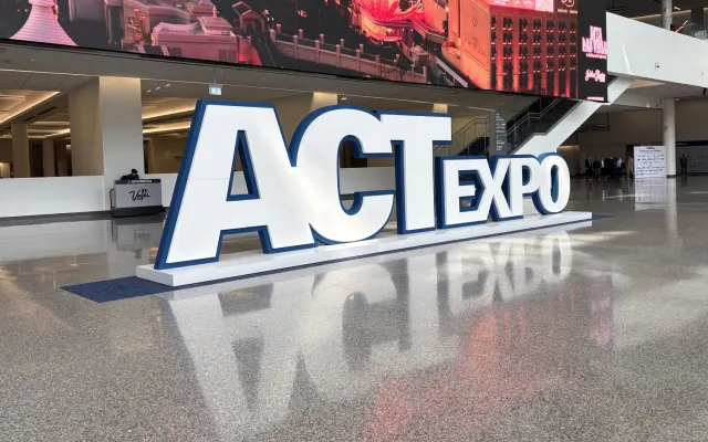 Big standing "ACTExpo" sign in convention center lobby 