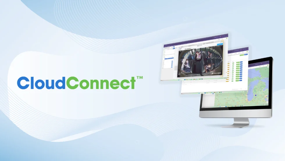Pro-Vision’s CloudConnect software shown on computer screens, featuring live bus interior video and GPS mapping for real-time fleet monitoring and management.