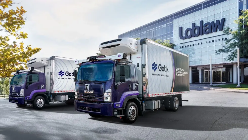 Purple Gatik autonomous trucks in front of Loblaw