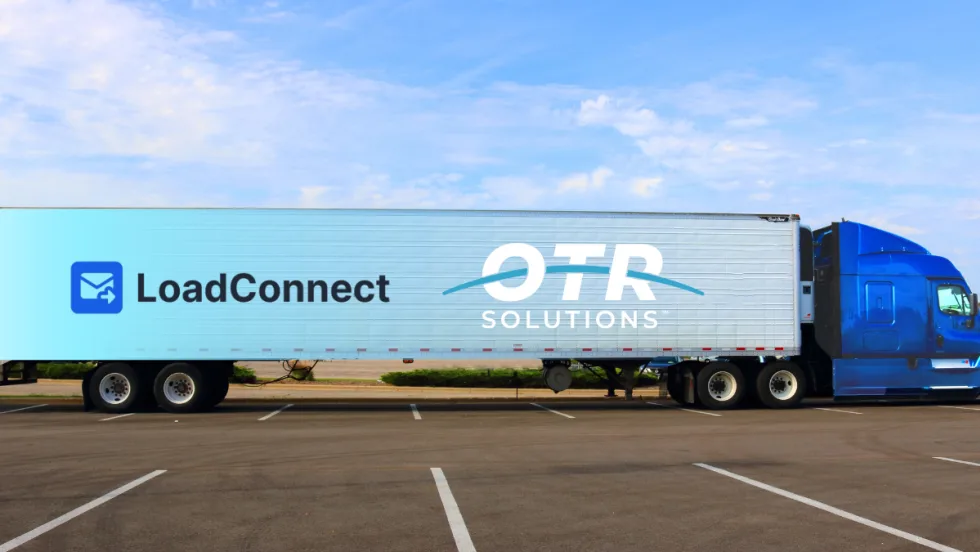 Logos of LoadConnect and OTR Solutions displayed over a freight container, representing the companies’ new partnership to boost carrier security and fraud prevention.