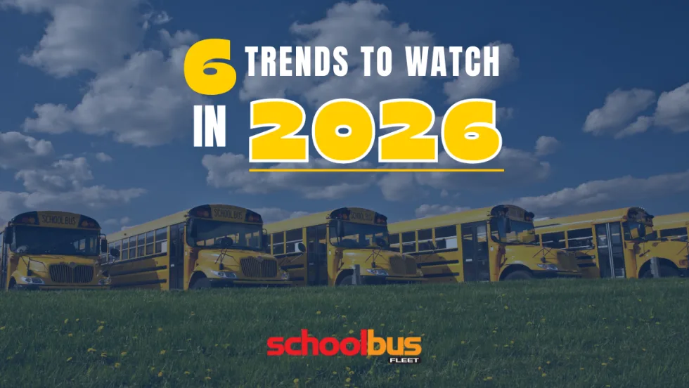 a row of school buses parked in a field with text on top that says "6 trends to watch in 2026" and the school bus fleet logo