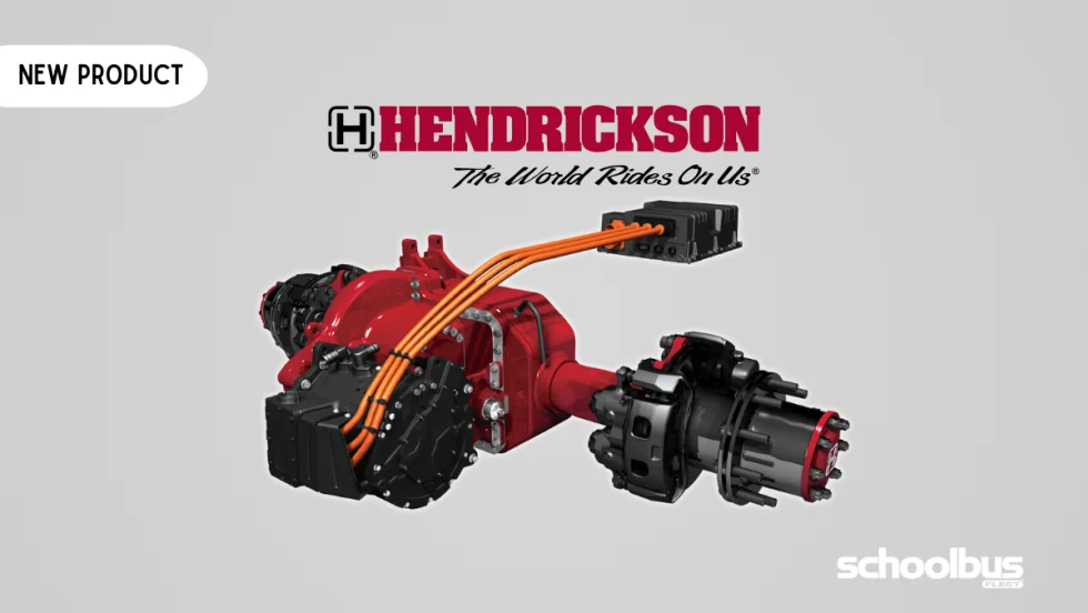 Graphic promoting Hendrickson's new ELECTRAAX electric axle system, featuring a red electric drive axle assembly with high-voltage orange cables connected to a control module. The Hendrickson logo and tagline, "The World Rides On Us," appear above the product against an orange gradient background, with a "New Product" label in the upper left and the School Bus Fleet logo in the lower right.