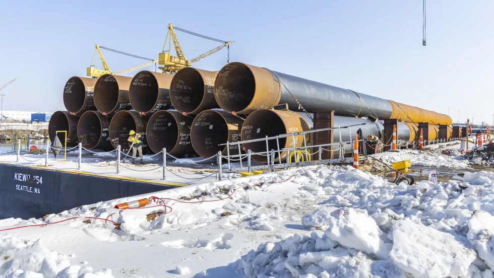 A snowy bridge construction staging zone.