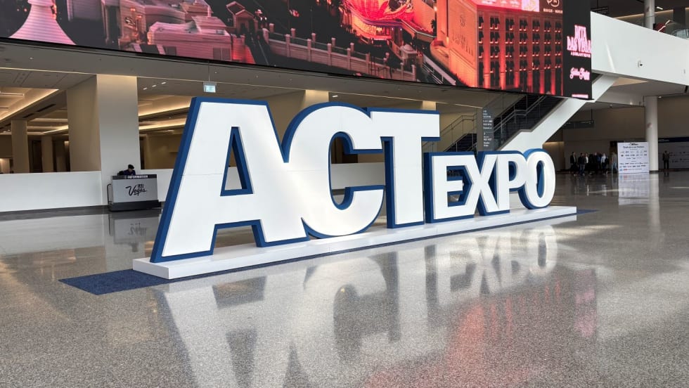 Big standing "ACTExpo" sign in convention center lobby 