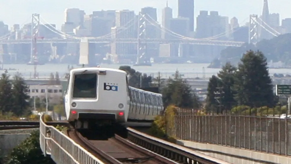 A BART train on the tracks.
