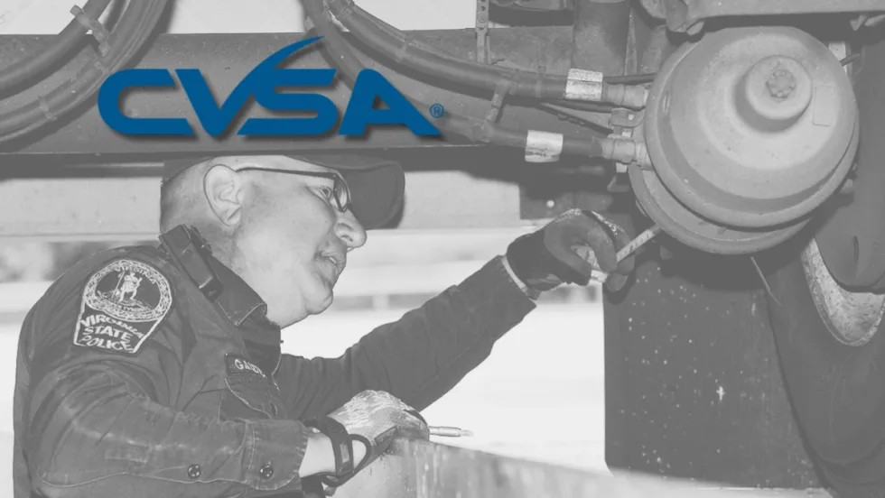 CVSA inspector photo in background with CVSA logo superimposed on top