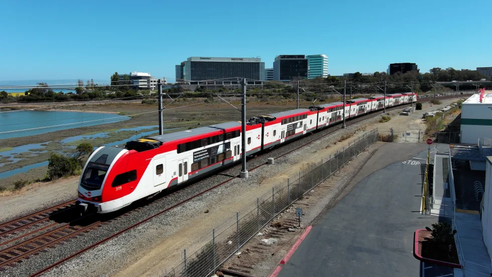 A Caltrain electric railcar on the tracks