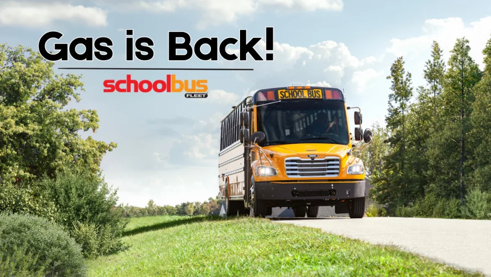 Yellow full-size school bus traveling along a tree-lined road beneath the words “Gas is Back!” in a School Bus Fleet graphic.
