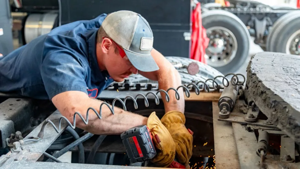 Huff and Puff Trucking technician at work.