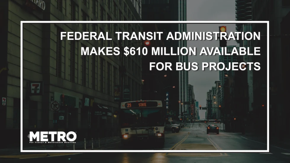 A public transit bus at a pedestrian crosswalk with text reading "Federal Transit Administration Makes $610 Million Available for Bus Projects."