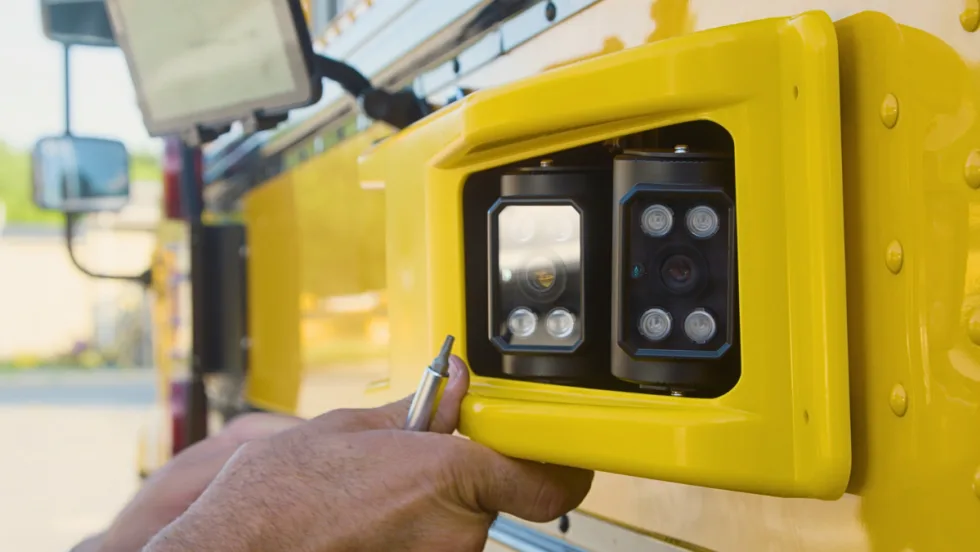 BusPatrol cameras on the side of a school bus.