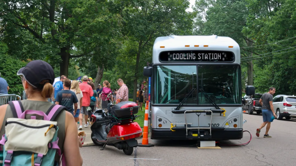  A bus that's powering the Beer Garden Stage and also serving as a Cooling & Charging Station for festival attendees.