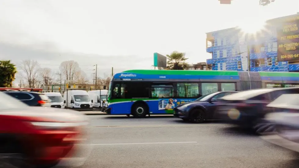 A blurry TransLink R2 rapid bus