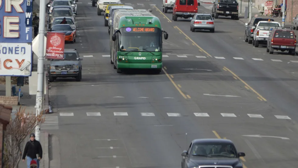 An RTC of Washoe County bus driving down Virginia Street.