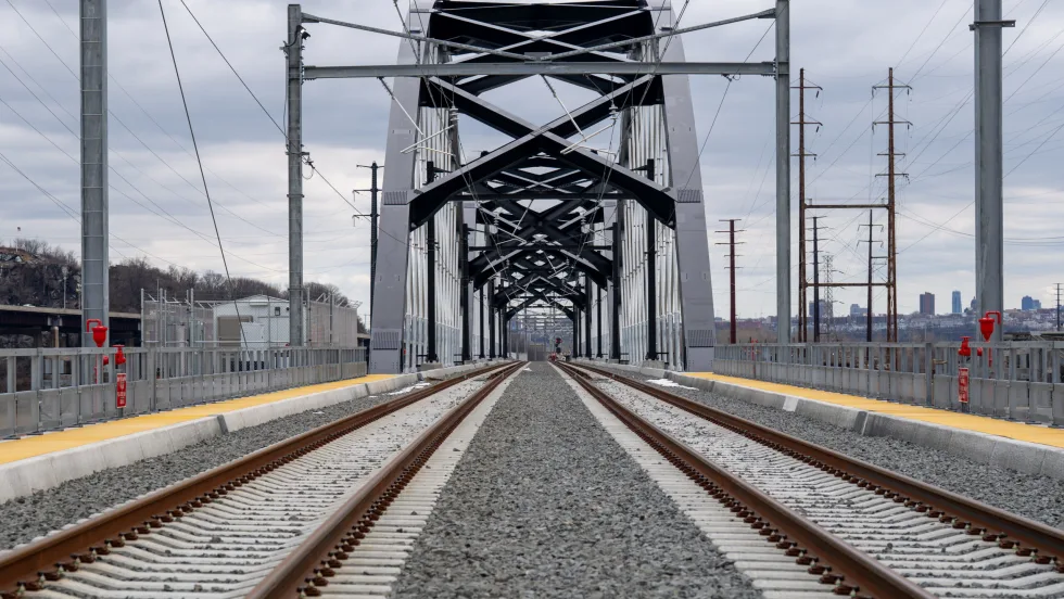 A view looking down the rail across the new Portal North Bridge.