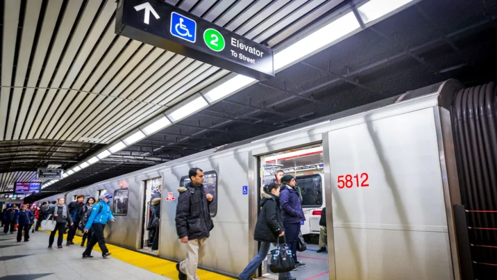 Riders boarding at a Toronto rail station.