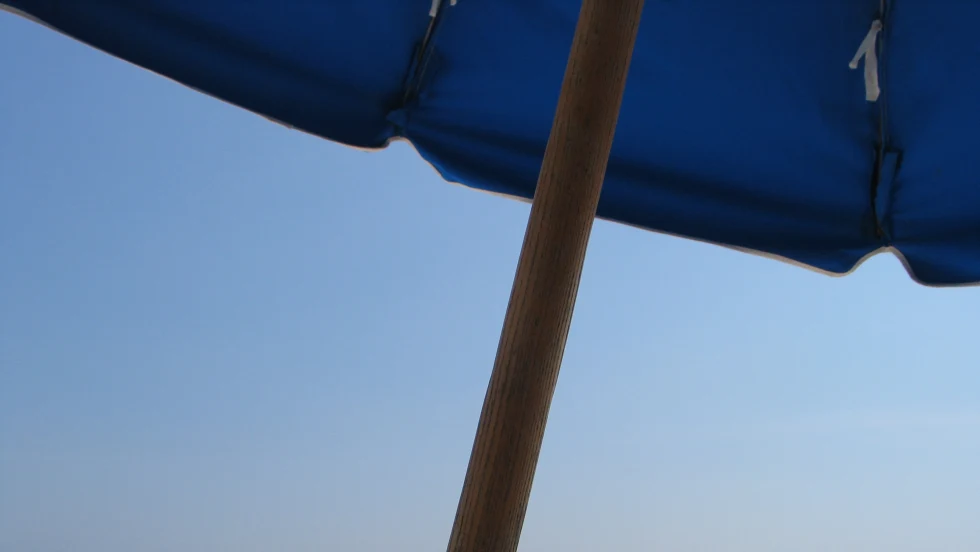 View of Gulf of Mexico from under beach umbrella
