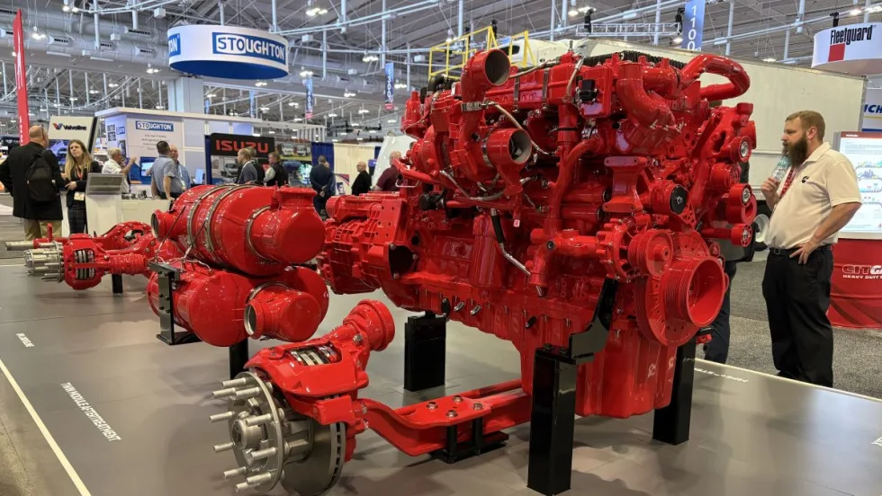 Red Cummins X15 powertrain display at TMC