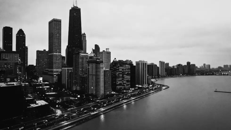 Black and white image of the Chicago city skyline.