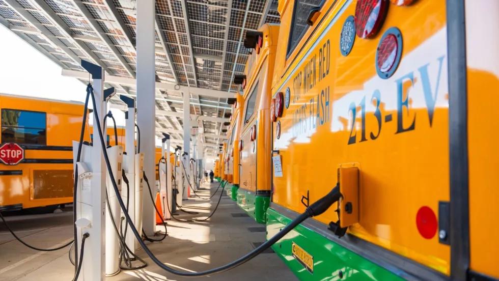a row of school bus chargers