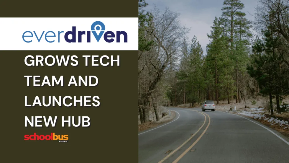 Image of a car driving on a paved forest road with text on the left reading "EverDriven grows tech team and launches new hub."