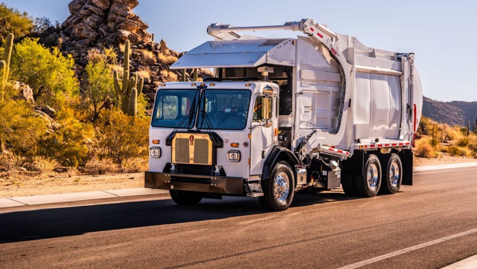 Kenworth L770E refuse truck.