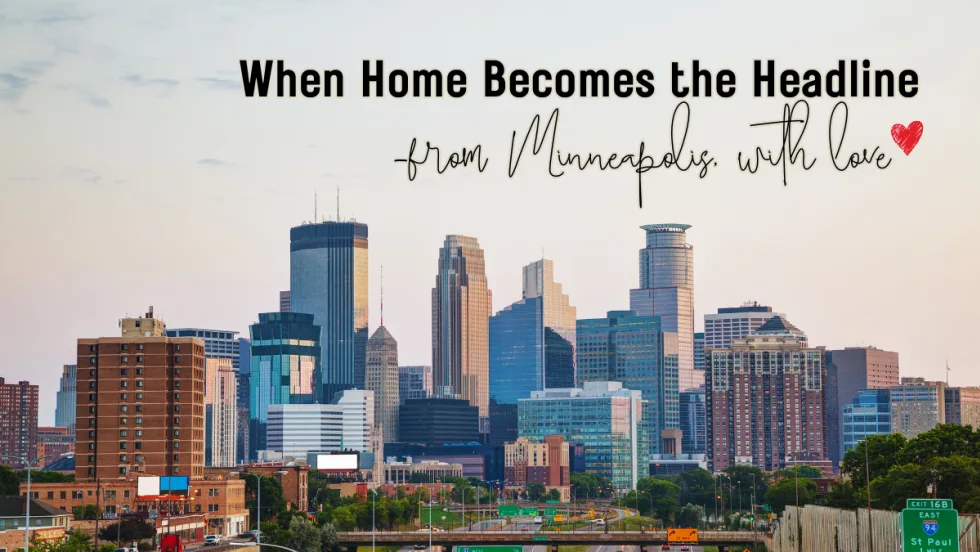 a cityscape photo of the minneapolis skyline with text overlay that says "When home becomes the headline. From Minnesota with love."