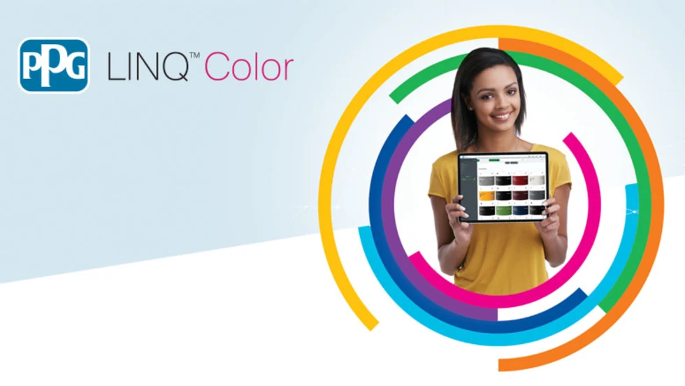 A woman holding a tablet with a screen showing rectangles of various colors