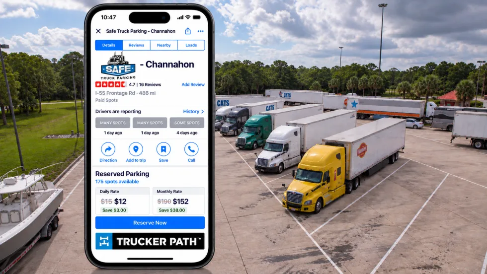 Illustration of trucks parked in lot with Trucker Path app on phone screen superimposed on top