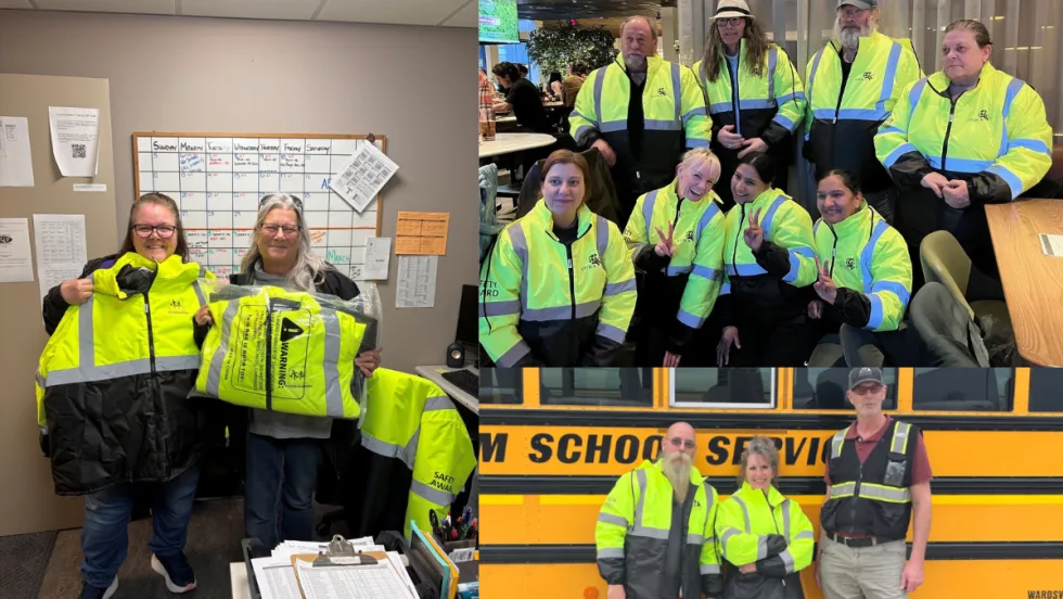 School transportation employees wearing high-visibility safety jackets pose in offices and near school buses as part of a driver safety recognition program.