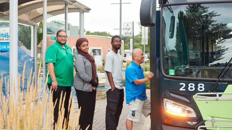  Customers queing to get on bus