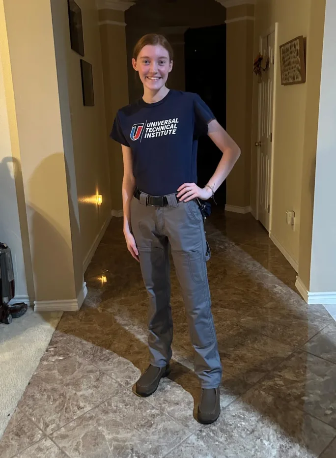 Young woman in Universal Technical Institute T-shirt