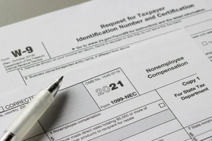Photo of W-9 and 1099 forms for independent contractors