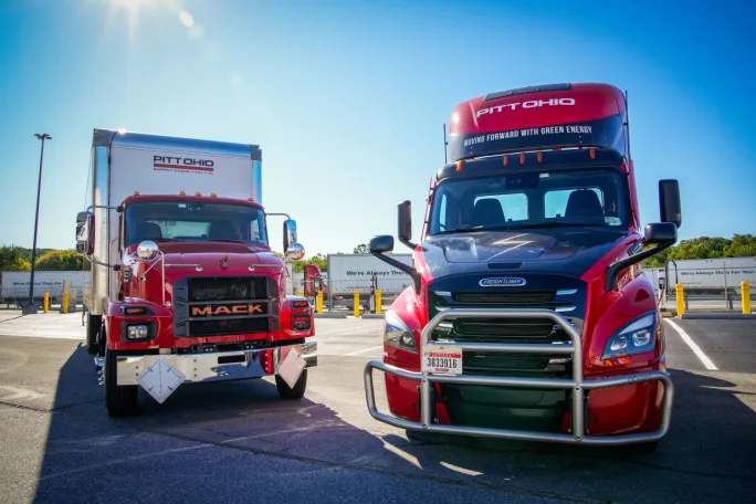 Two red trucks