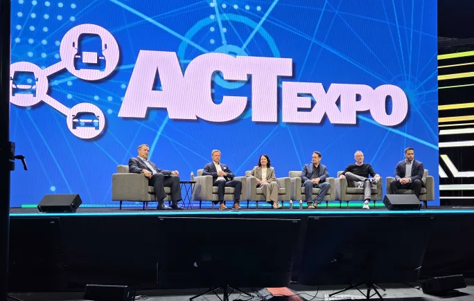 panelists on stage at act expo