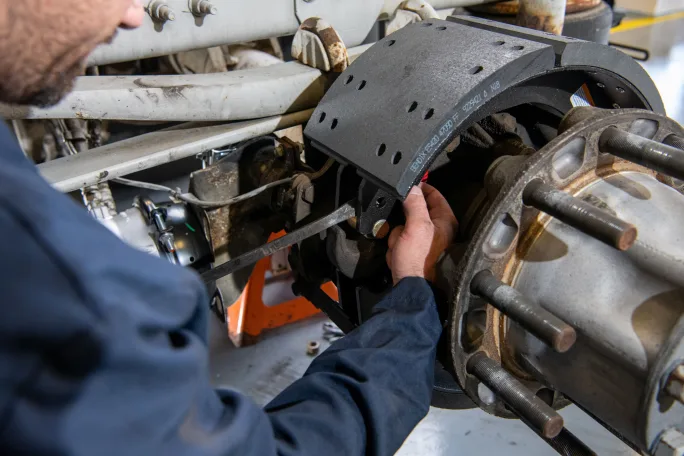 picture of a technician checking a drum brake