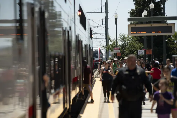 Crowd on platform of Caltrain tracks