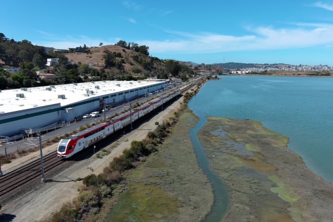 A Caltrain vehicle near a Penninsula in the Califronia Bay Area
