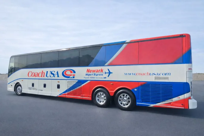 A Coach USA wrapped vehicle