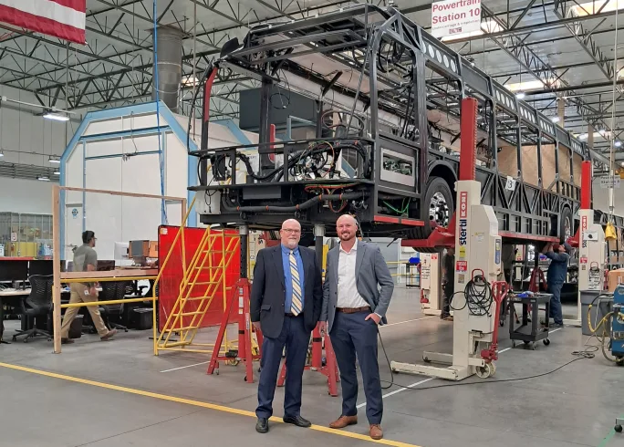 John Obert and Mike Crostic at ENC's bus manufacturing facility.